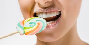 woman eating a lollipop